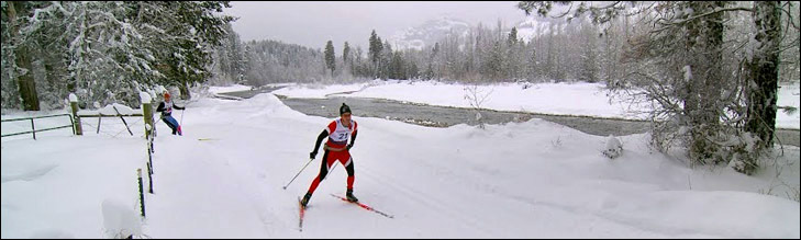 photo of ski racers on riverside groomed trail