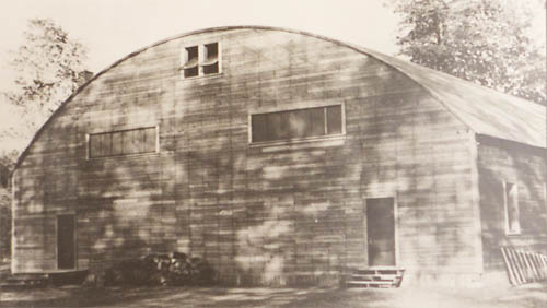 curved roof large wood building